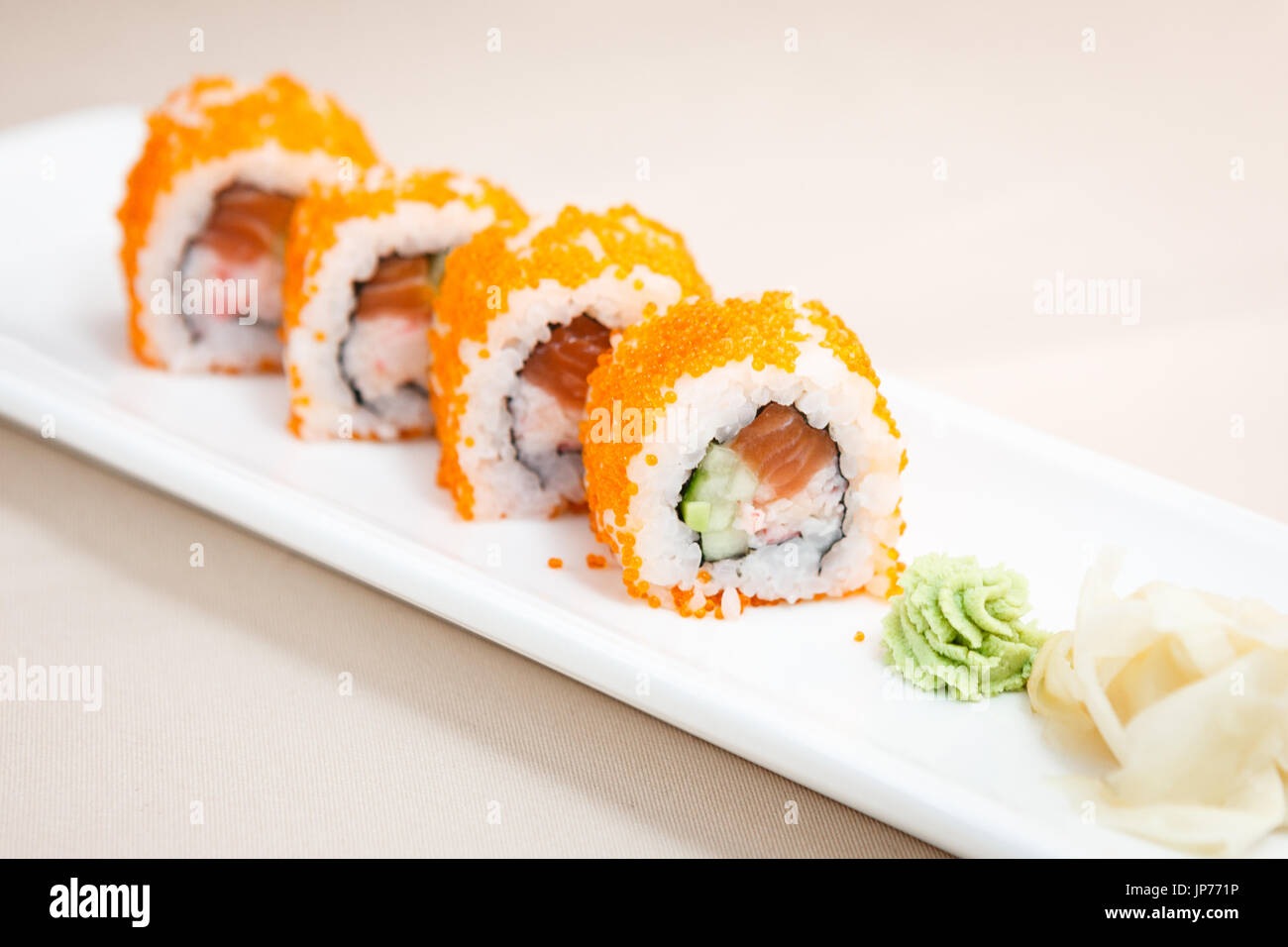 Flying fish roe maki Stock Photo - Alamy
