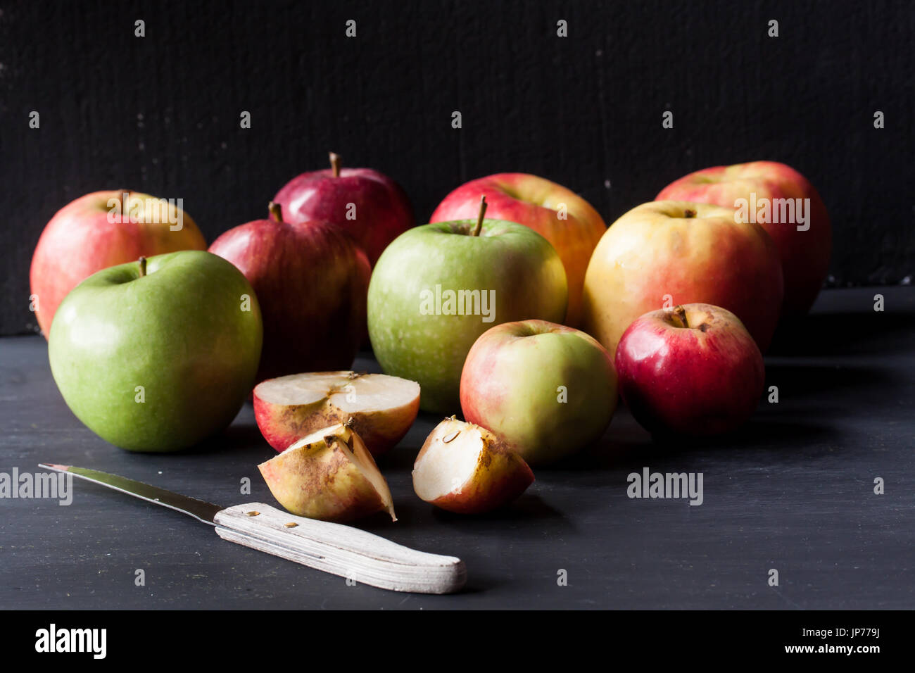 red and green apples on a black background Stock Photo