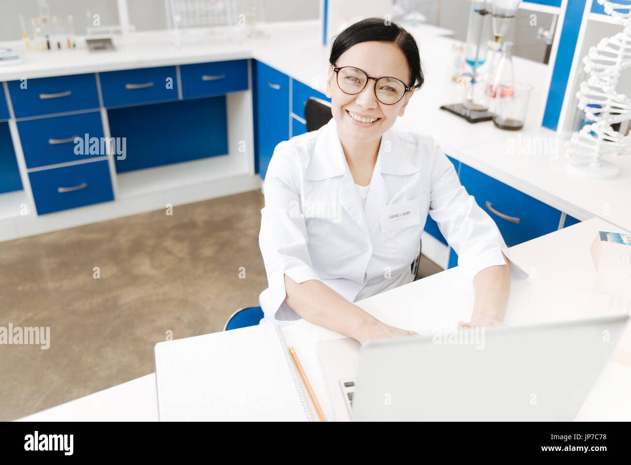 Happy professional scientist looking at you Stock Photo