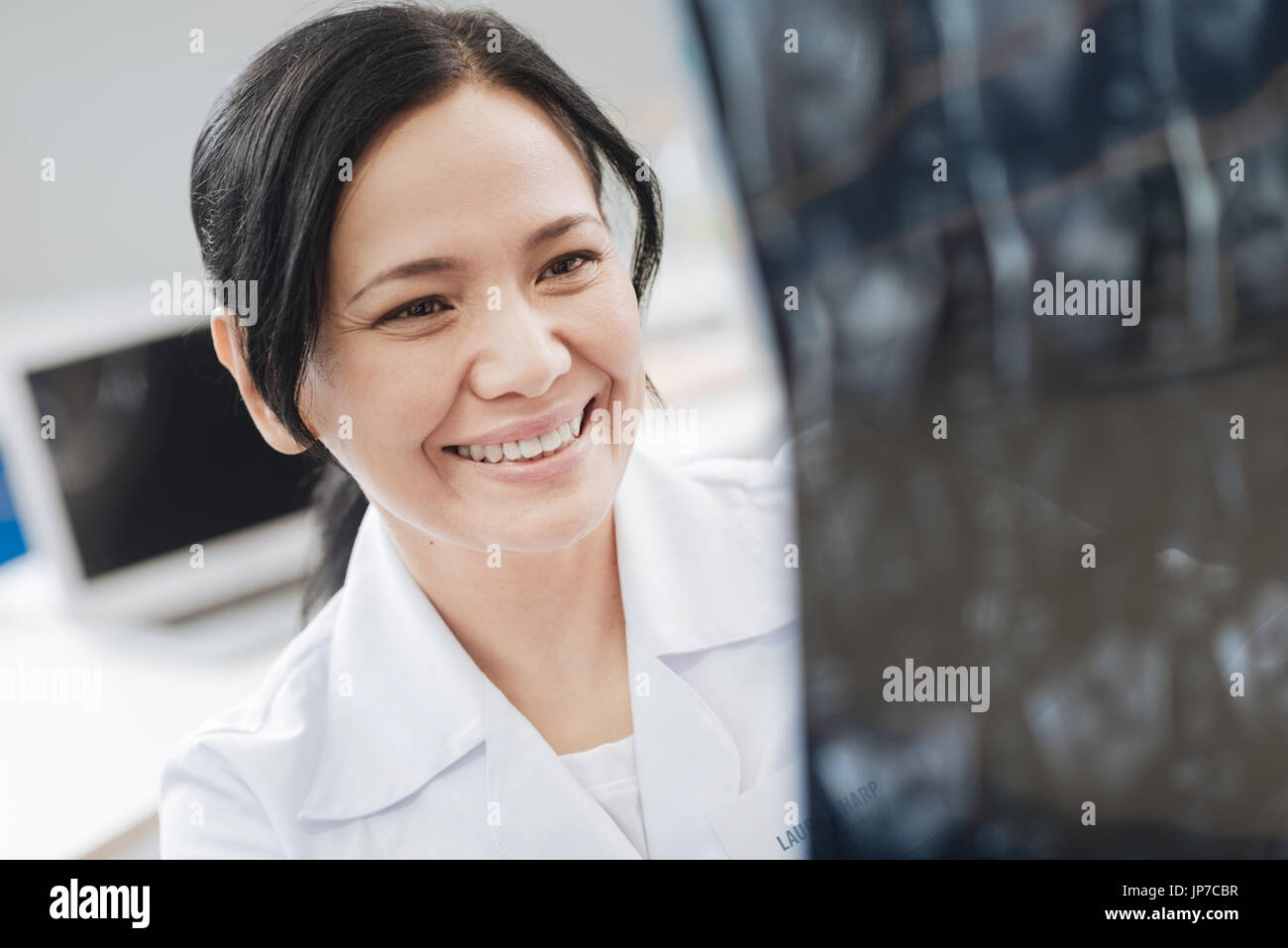 Happy emotional woman smiling Stock Photo