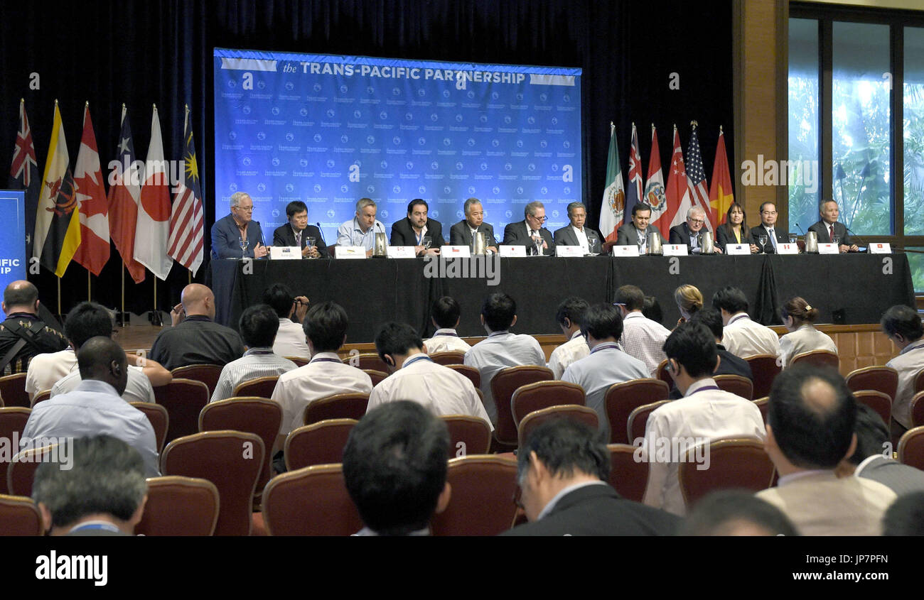 Trade ministers from 12 Pacific Rim countries attend a press conference ...
