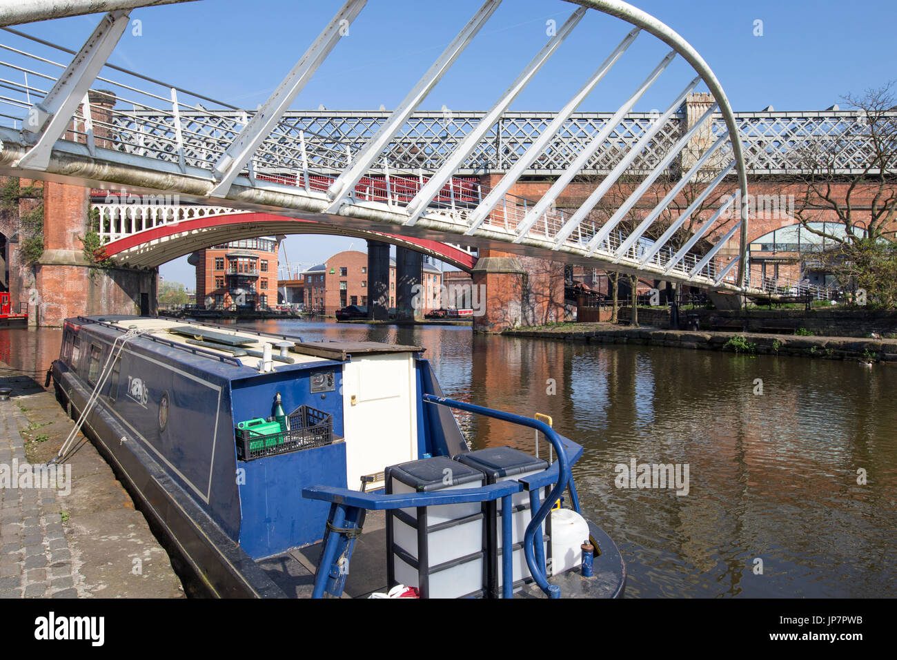 View of Castlefield Basin & the Merchant’s Bridge, with the historical rail bridge and Potato Wharf in the background Stock Photo