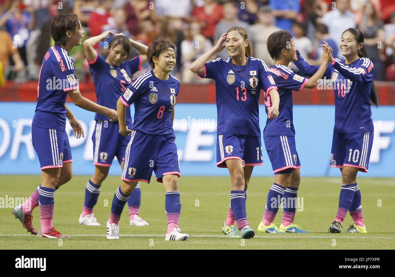 Japanese soccer players celebrate their 21 win over the Netherlands in