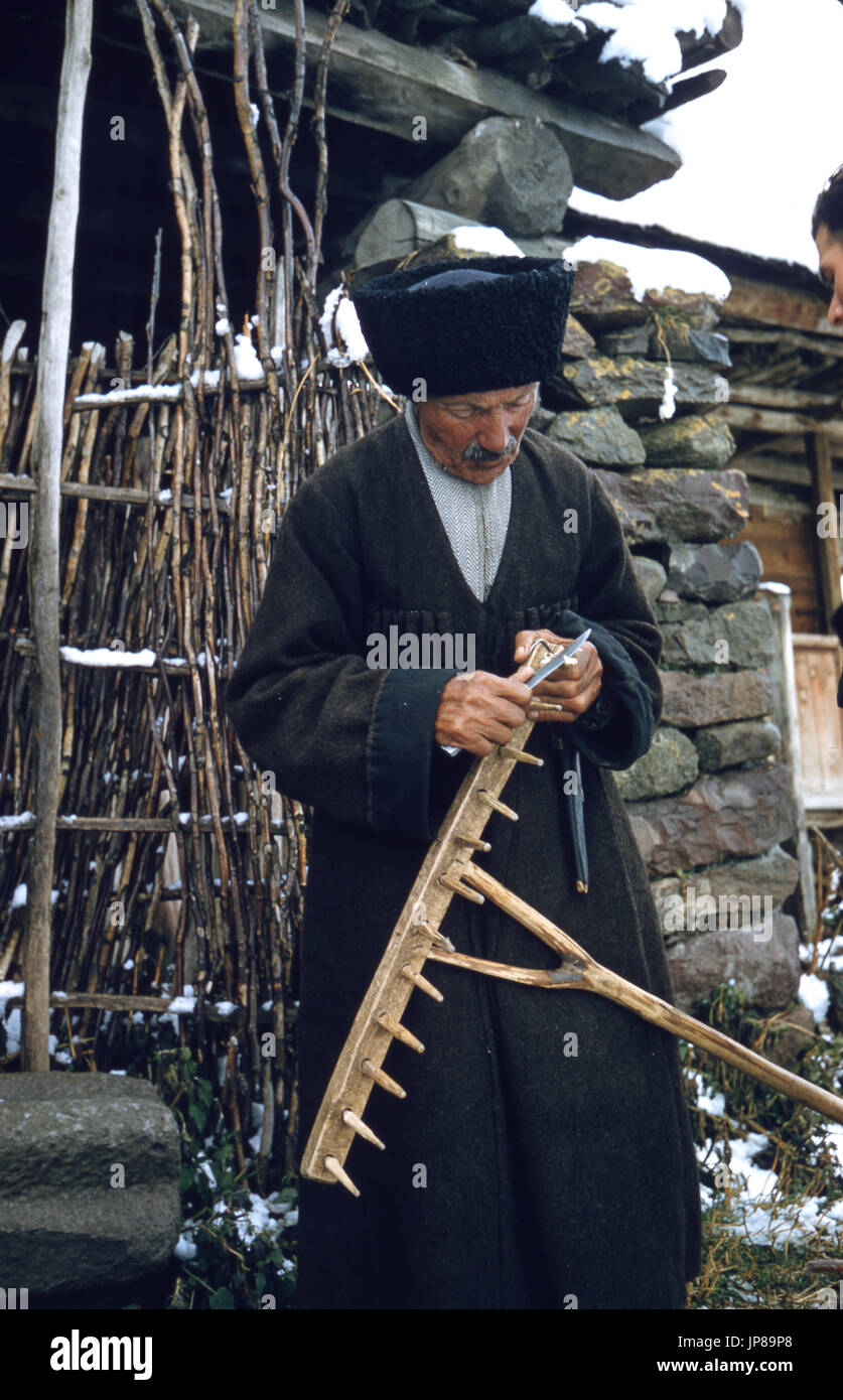 Elderly Cossack in a remote village in the Caucasus Mountains, in Soviet Georgia near Tbilisi, 1956. He is wearing the cherkeska Cossack uniform. Stock Photo