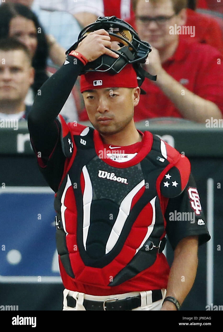 The San Francisco Giants' bullpen catcher Taira Uematsu adjusts his gear in  Cincinnati, Ohio, on July 13, 2015, the eve of the MLB All-Star Game. It  was his third All-Star event appearance. (