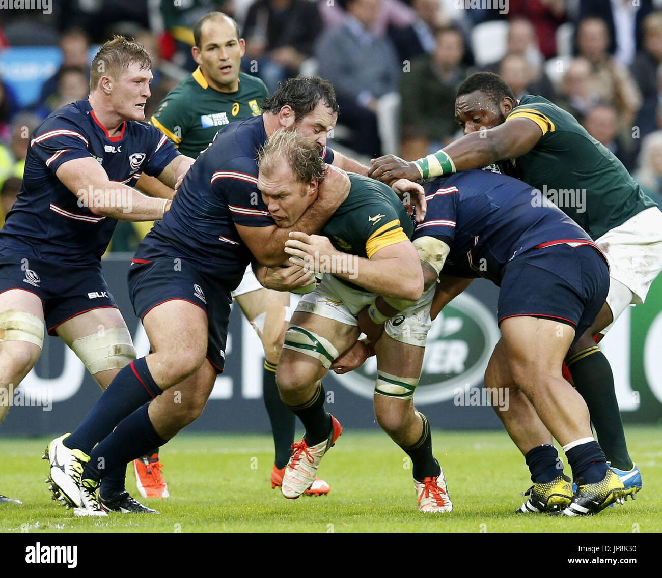 South Africa's Schalk Burger (C) makes a dash during the first half of ...