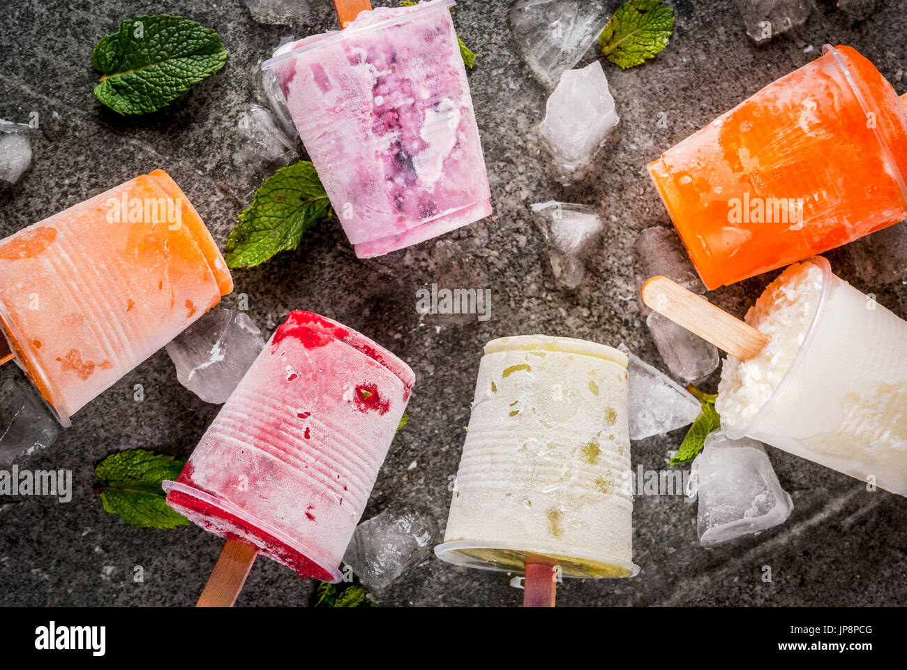 Healthy summer desserts. Ice cream popsicles. Frozen tropical juices