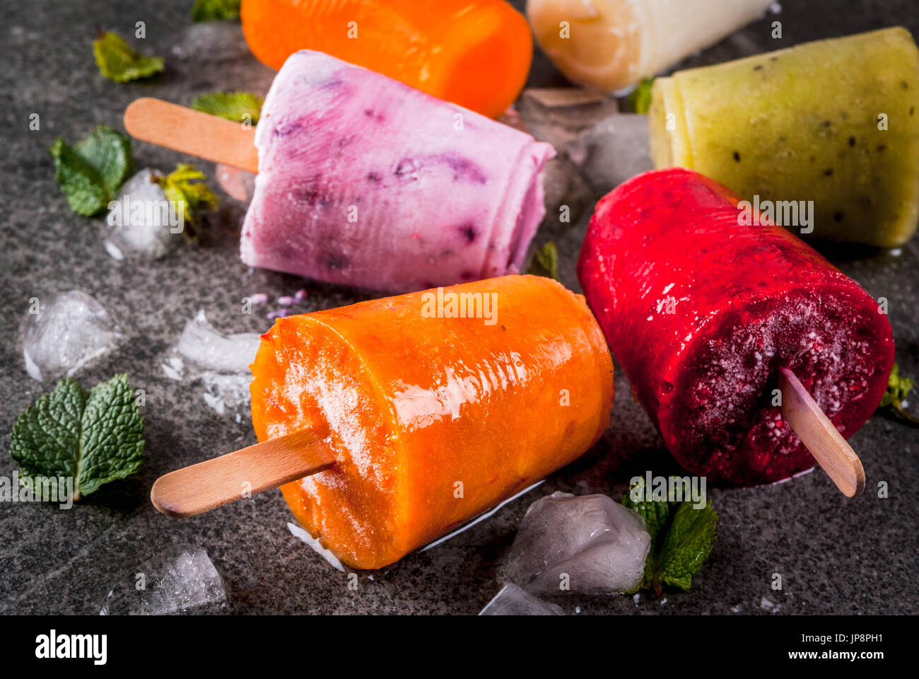 Healthy summer desserts. Ice cream popsicles. Frozen tropical juices