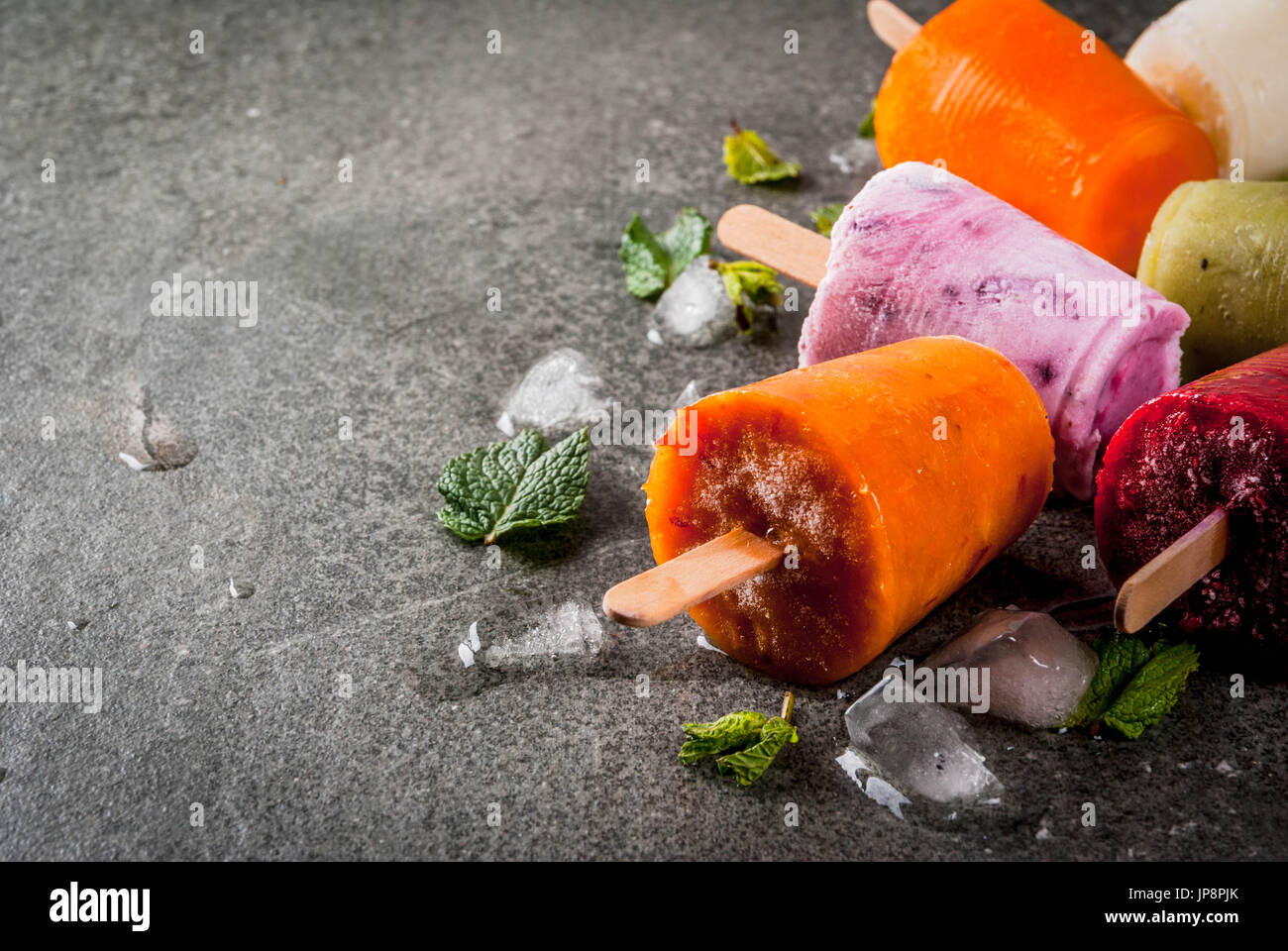 Healthy summer desserts. Ice cream popsicles. Frozen tropical juices
