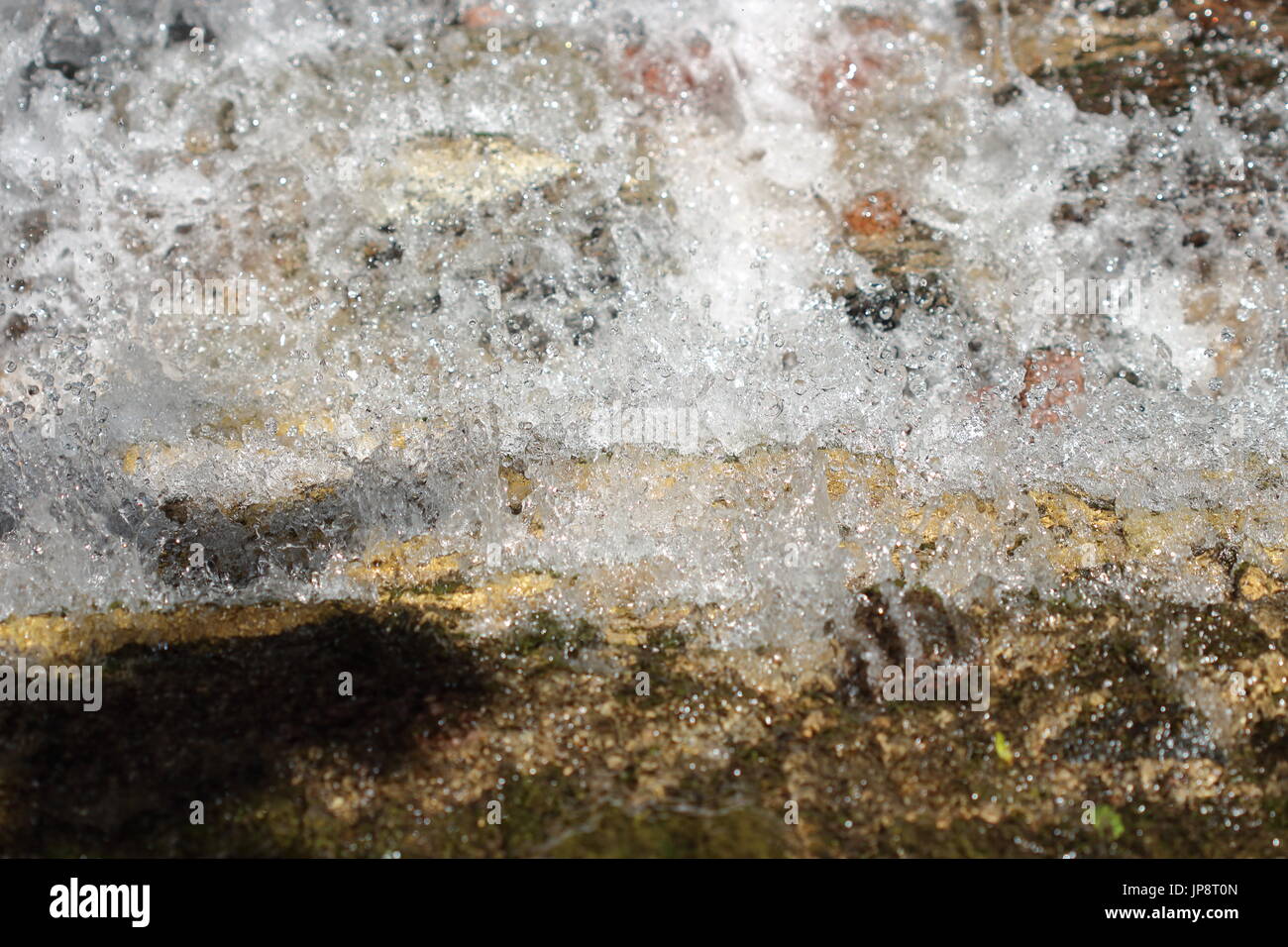 Waterfall with clear water, stone, bubbles. Natural element for design ...