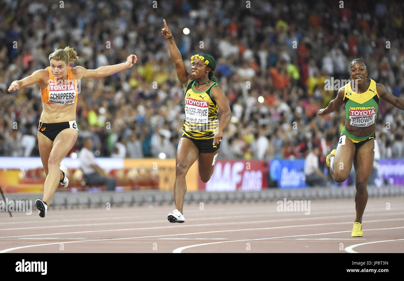 Jamaican sprinter Shelly-Ann Fraser-Pryce (C) celebrates after winning ...