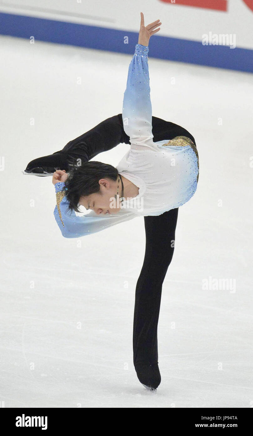 Japanese figure skater Yuzuru Hanyu performs during the men's short