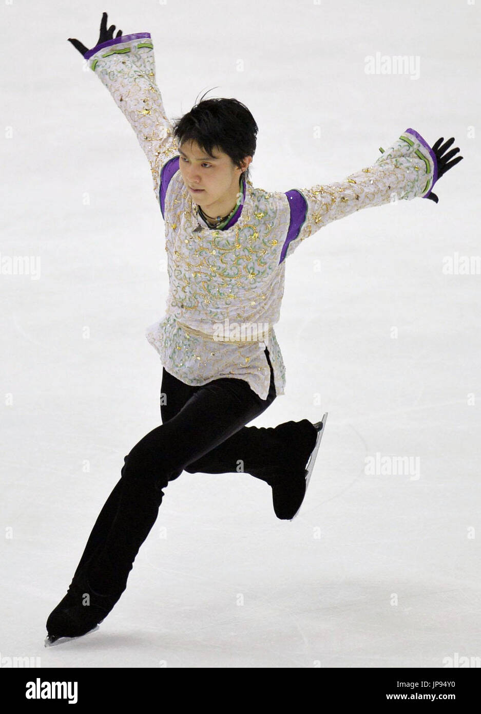 Figure skater Yuzuru Hanyu performs during the men's free skate at the NHK Trophy in Nagano