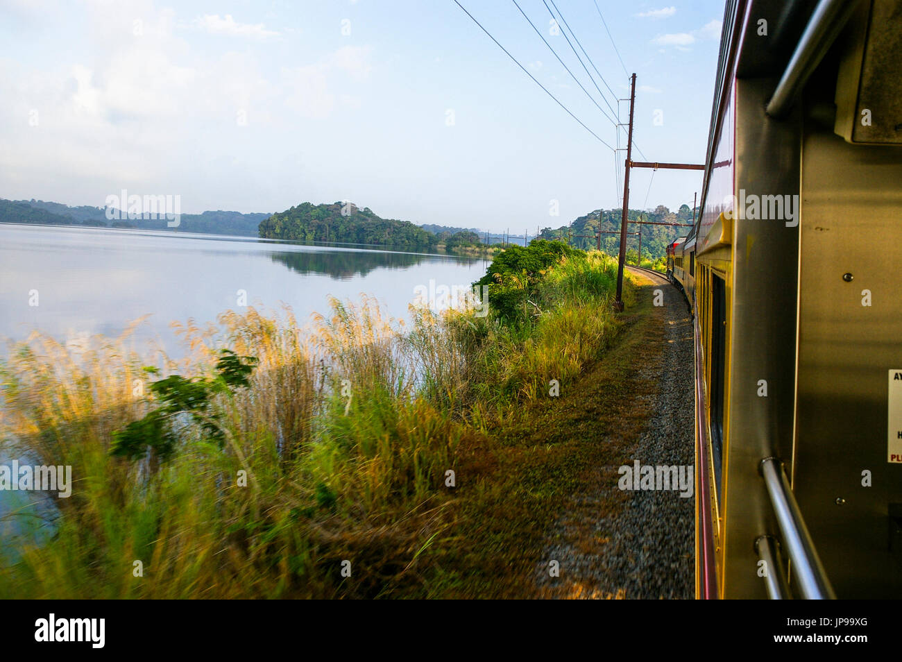 View of gatun lake from the panama canal railway train traveling from Panama City to Colon Stock Photo