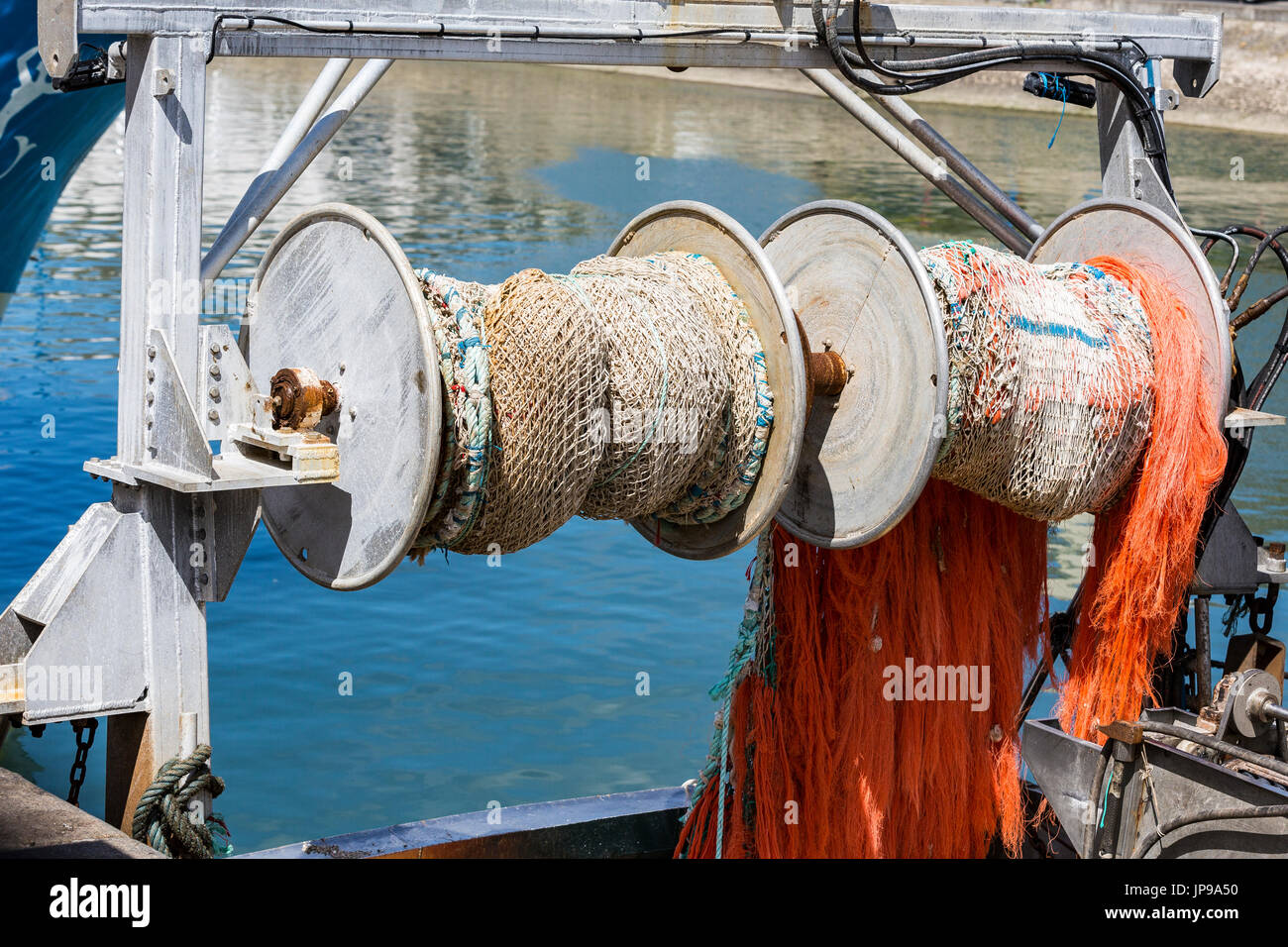 Fishing colored net on boat industrial fish Stock Photo Alamy
