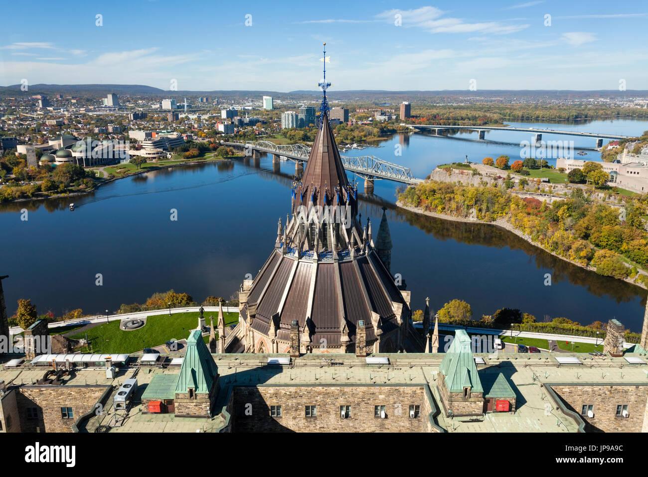 A view of the Library of Parliament, the Ottawa River and Gatineau, Québec from the observation deck inside the Peace Tower part of Centre Block. Stock Photo