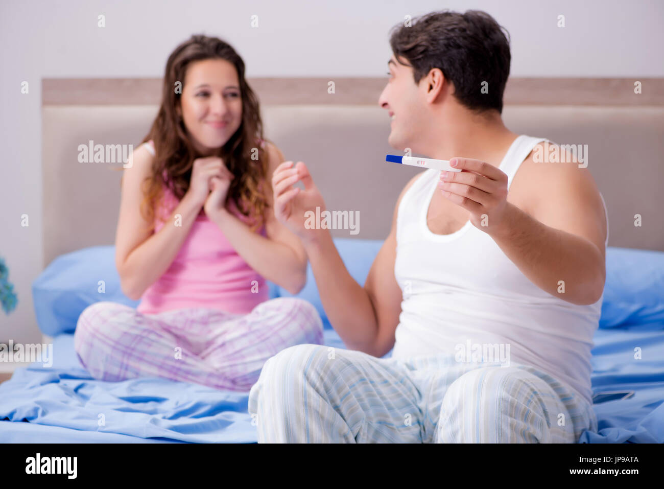 Young Family With Pregnancy Test Results Stock Photo Alamy