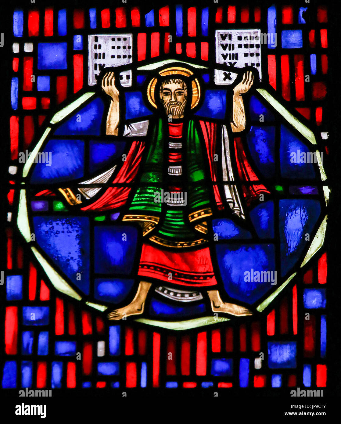 Stained Glass in Wormser Dom in Worms, Germany, depicting Moses with the Stone Tablets and the Ten Commandments Stock Photo