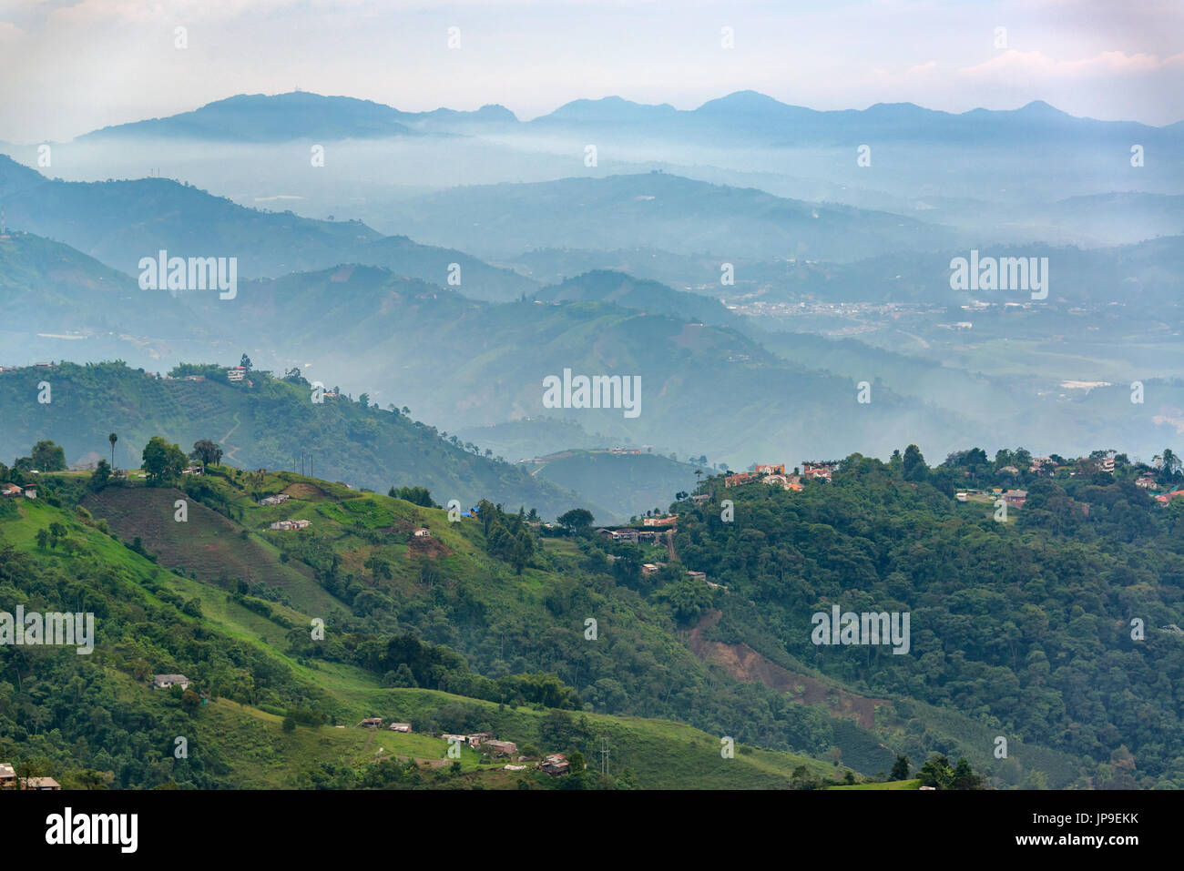 Lush green rolling hills landscape on the outskirts of Manizales, Colombia Stock Photo