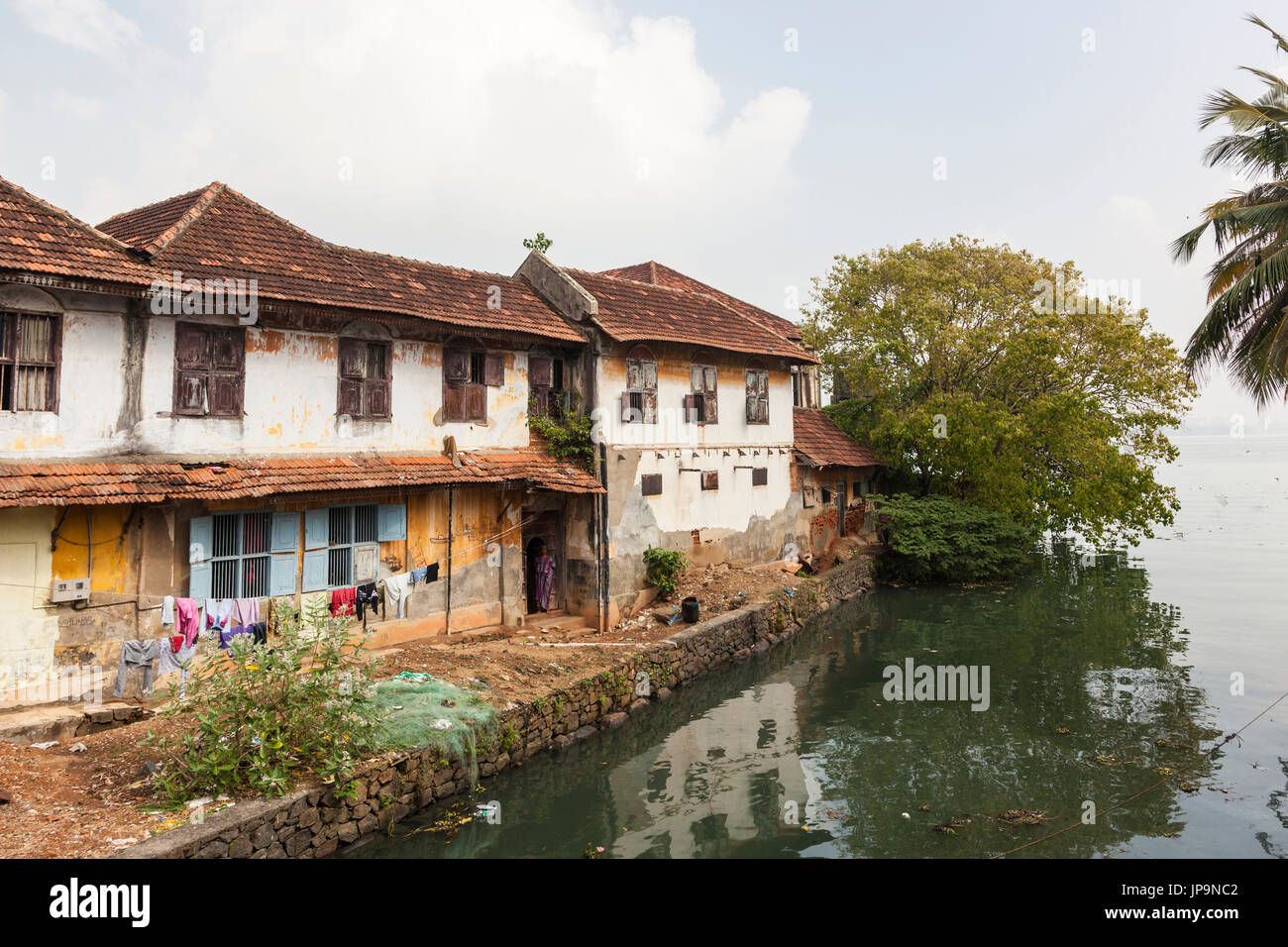 House on a canal in Fort Kochi, Kerala, India Stock Photo