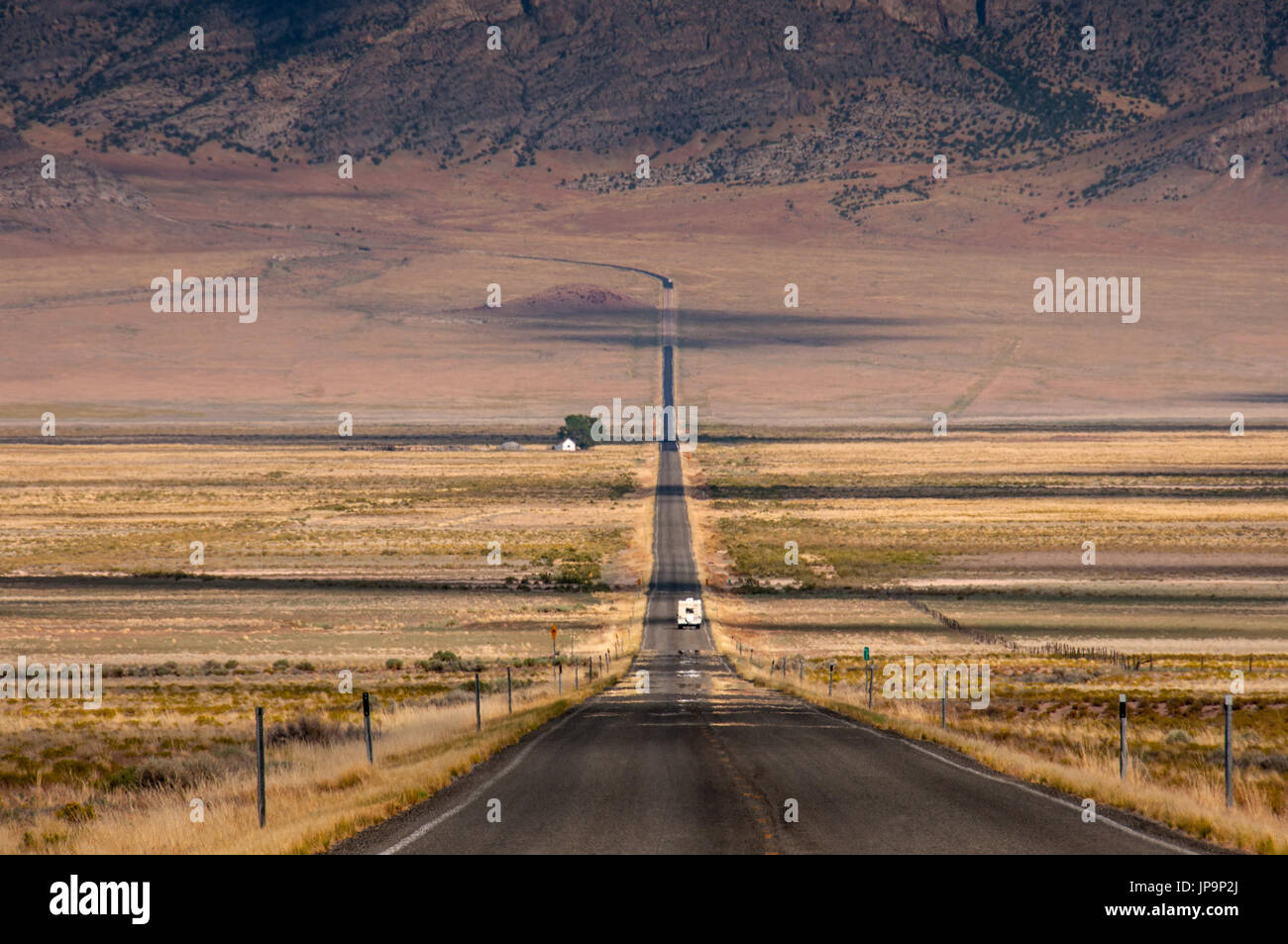 Lonely road in Nevada America USA Stock Photo