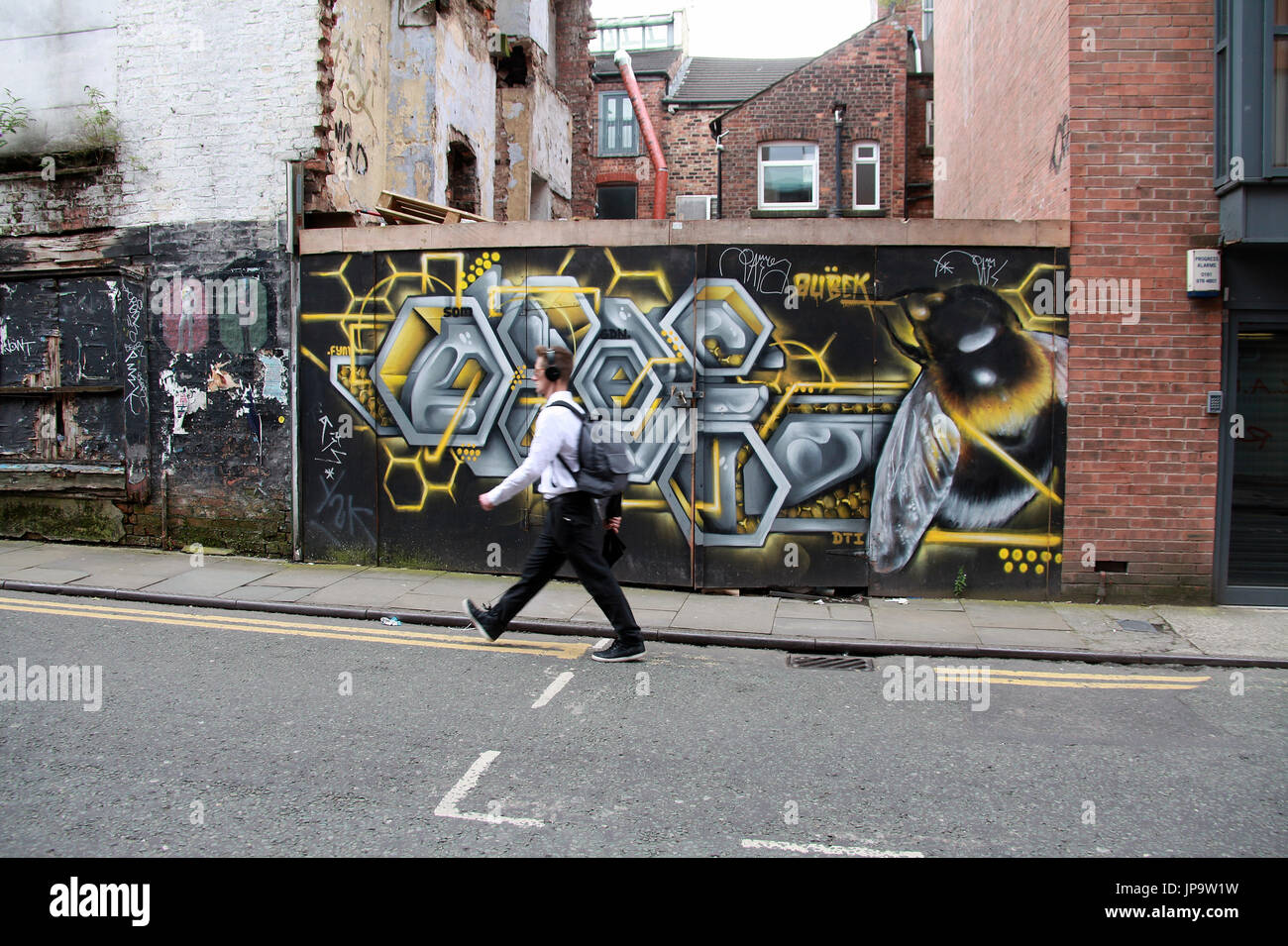 Street art by Russell Meeham who is known as Qubek in the Northern Quarter of Manchester city centre Stock Photo