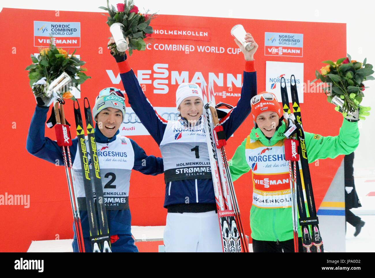 Winner Jarl Magnus Riiber of Norway (C), secondplace finisher Akito