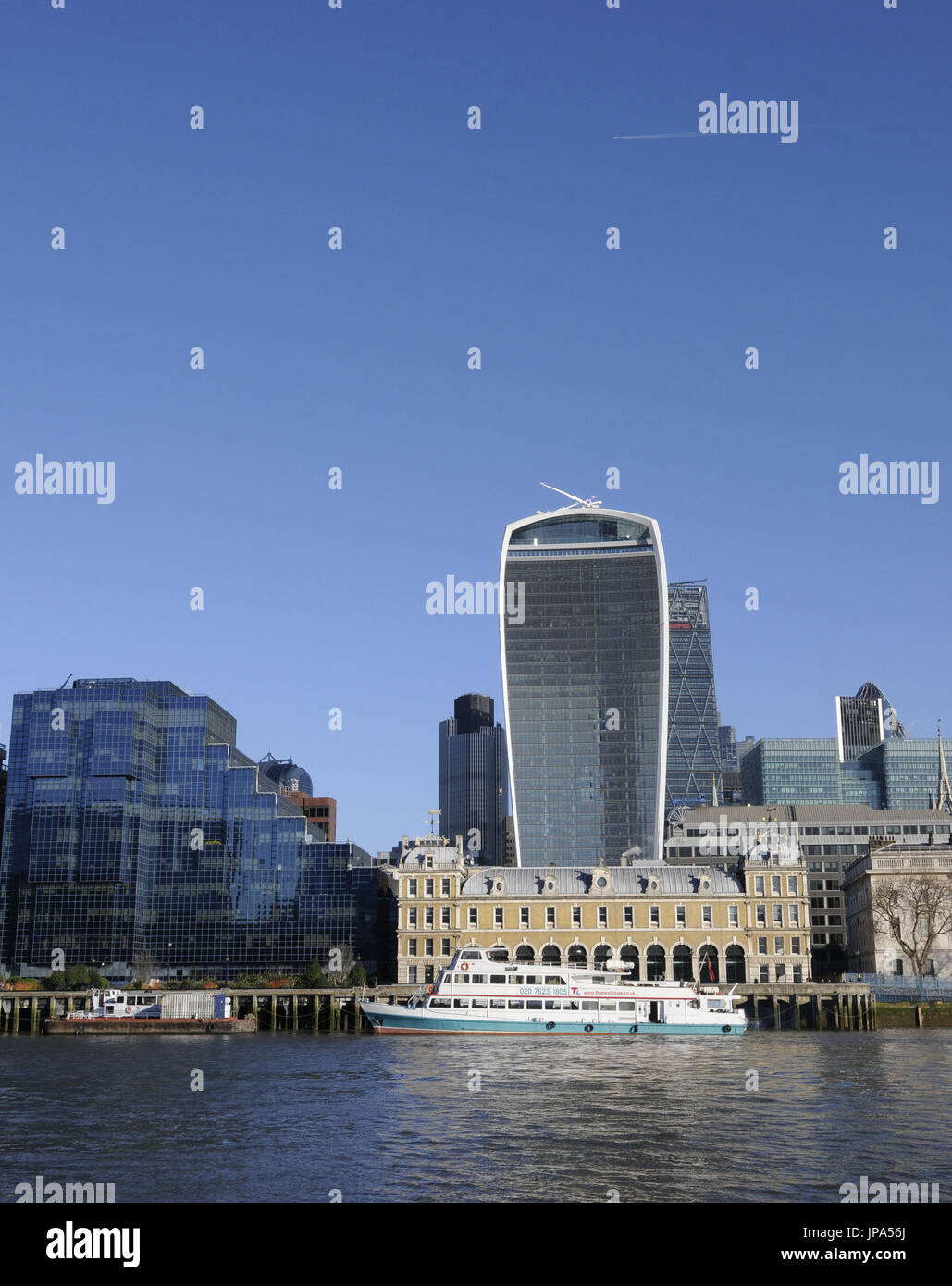 The view over the River Thames to the Modern Skyline of City of London with the Walkie Talkie and Cheesegrater Buildings London England Stock Photo