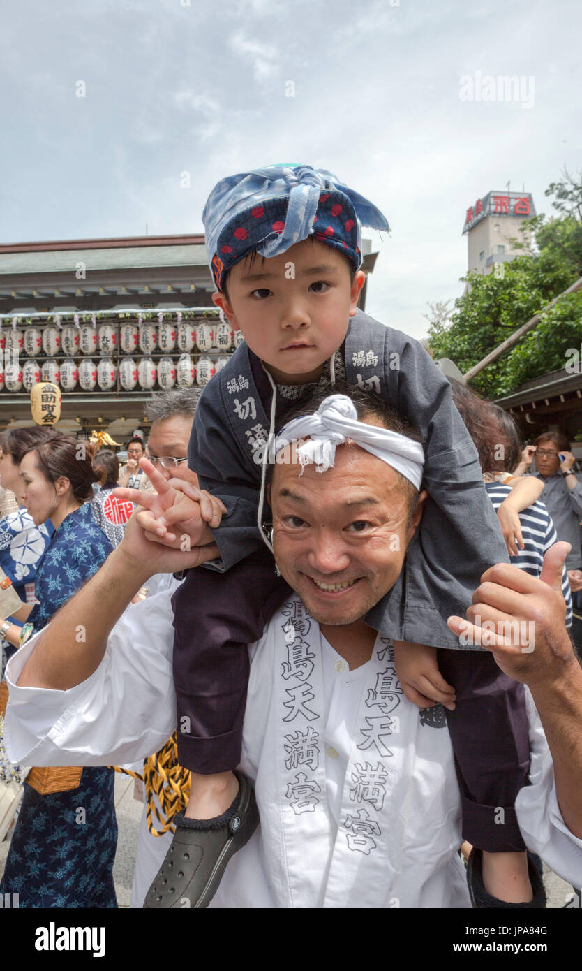 Japan, Tokyo City, Ueno District, Yushima Shrine, father and son Stock Photo