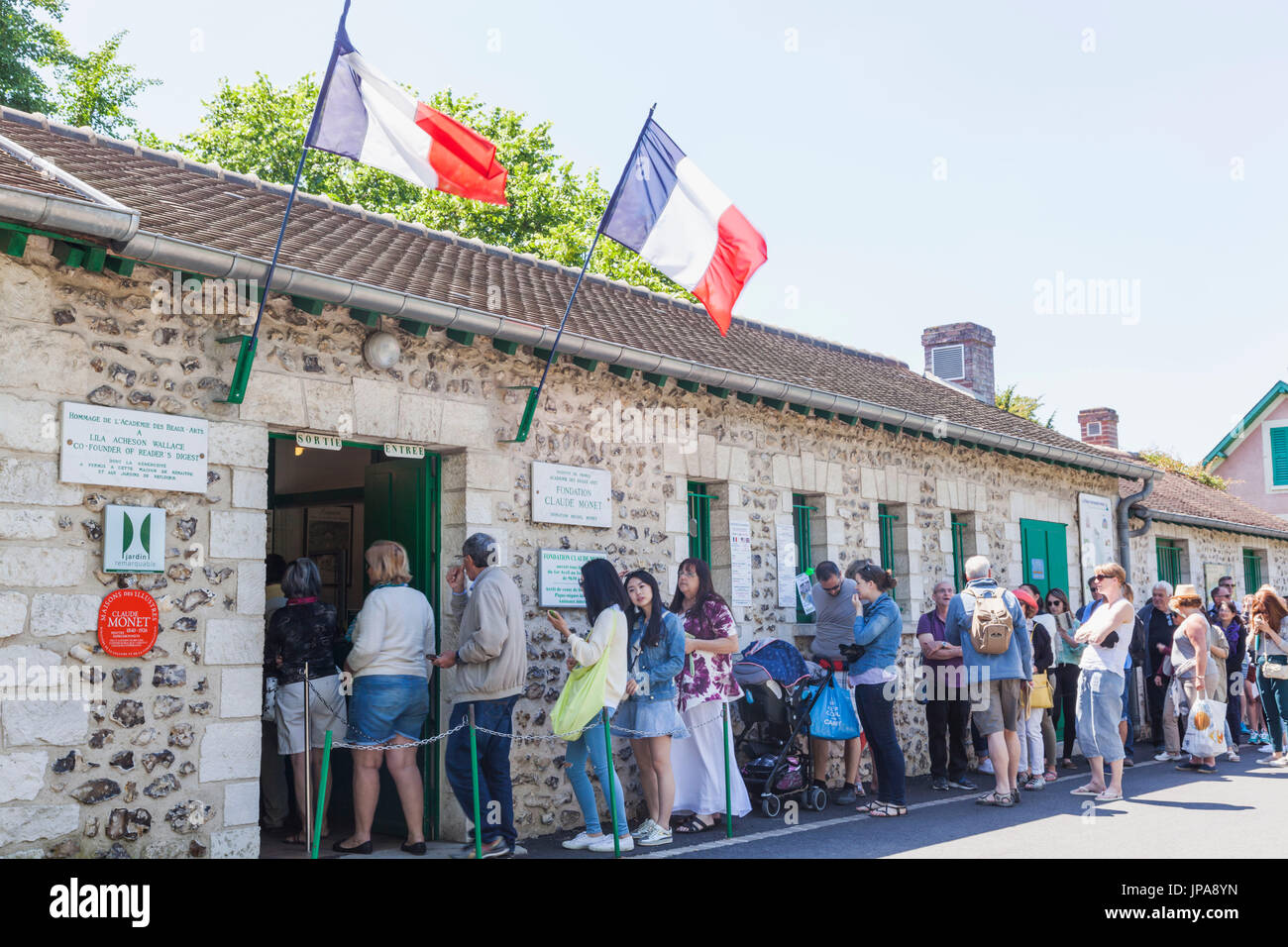France, Normandy, Giverny, Visitors Queuing to Enter Monet's Garden Stock Photo