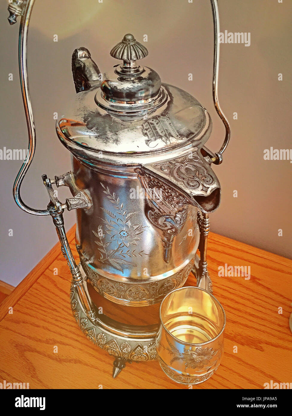 Shiny Vintage Metal Coffee Pot On White Table Stock Photo, Picture and  Royalty Free Image. Image 40463613.
