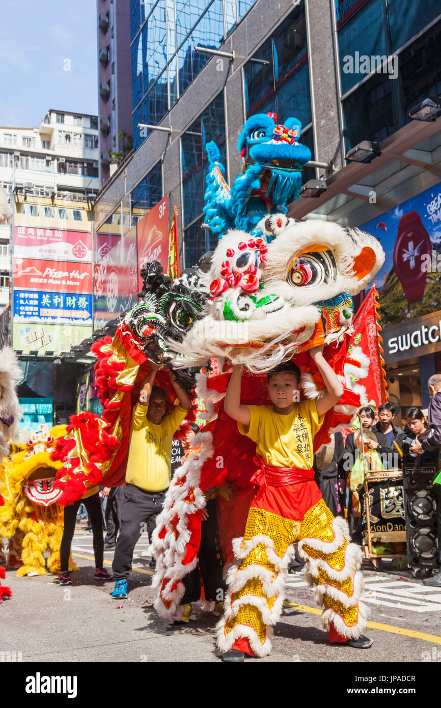 China, Hong Kong, Annual New Years Day Festival Parade, Chinese Lion Dancers Stock Photo