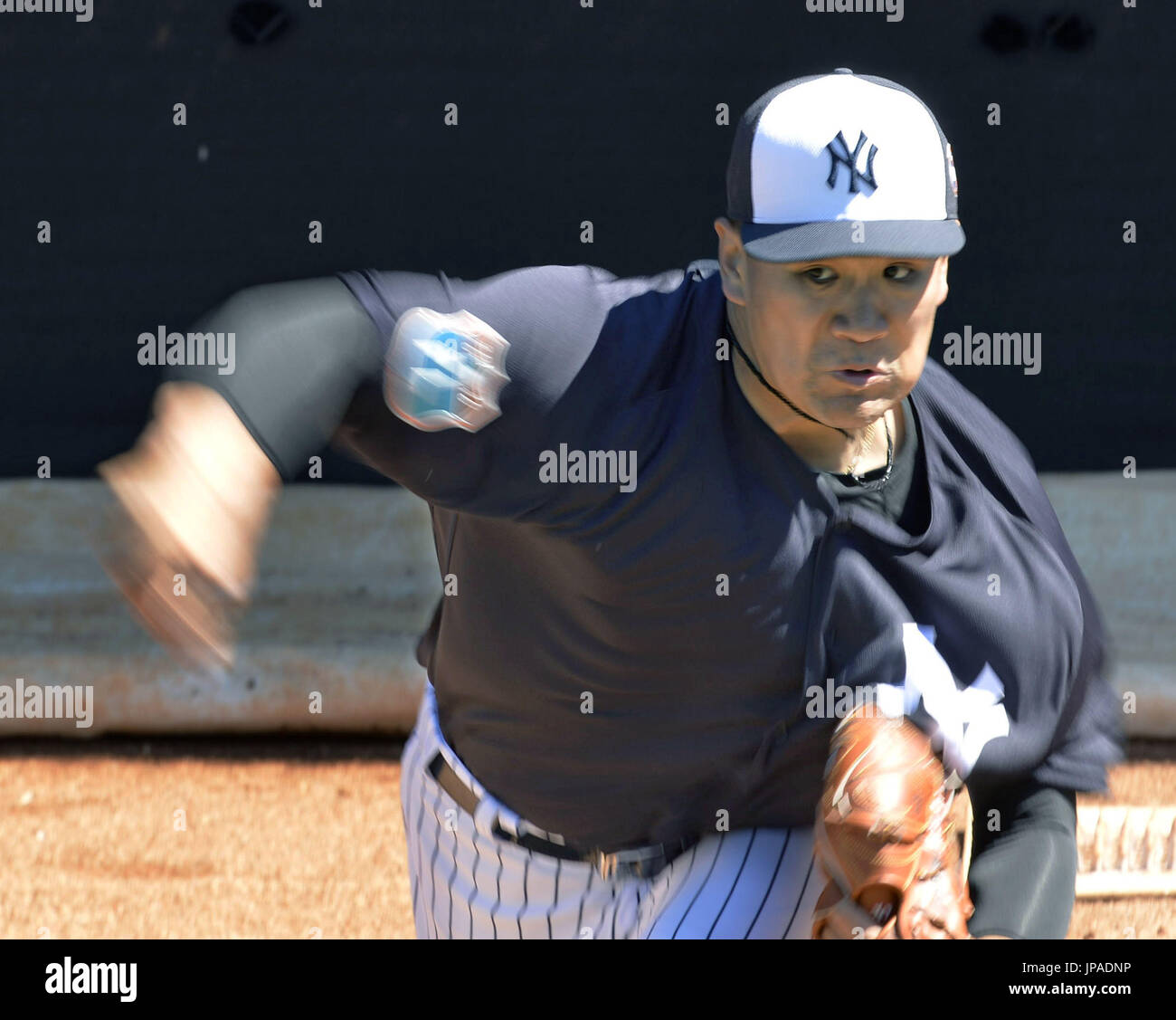 Bullpen Session New York Yankees right-hander Masahiro Tanaka throws 61 pitches in a ...