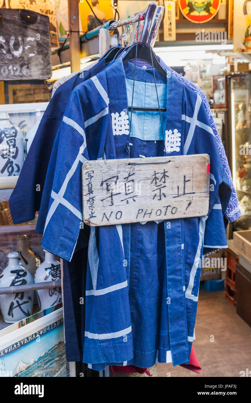 Japan, Honshu, Tokyo, Asakusa, Antique Shop Display of Vintage Clothing with No Photography Sign Stock Photo