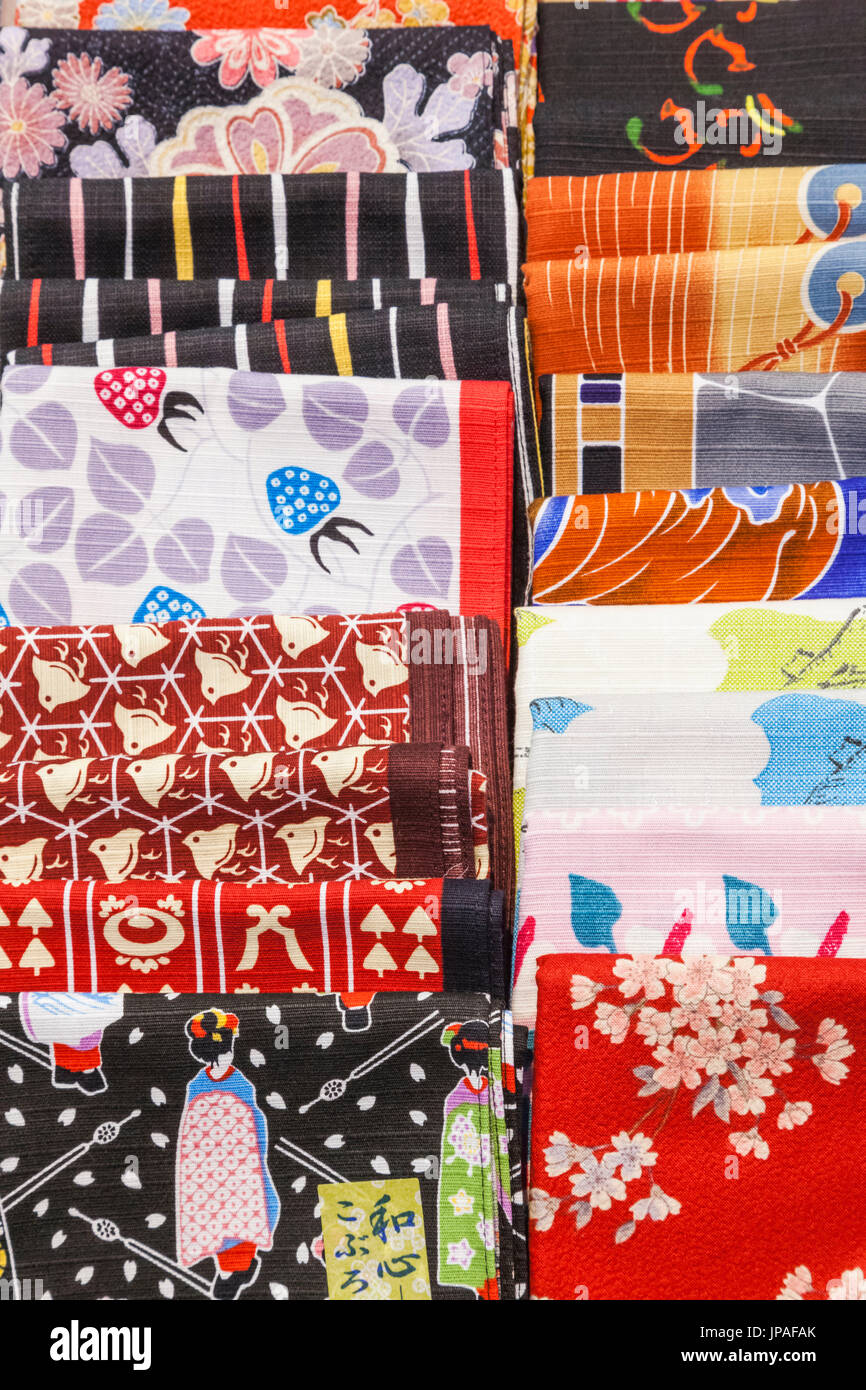 Shop display of traditional japanese scarves hires stock photography