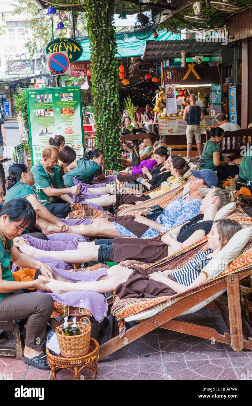 Thailand, Bangkok, Khaosan Road, Tourists Having Foot Massage Stock