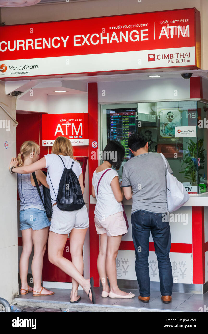 Thailand, Bangkok, Khaosan Road, Tourists at Currency Exchange Booth Stock Photo