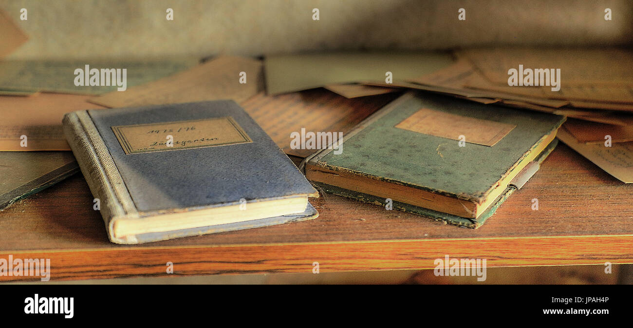 old books in an abandoned office Stock Photo