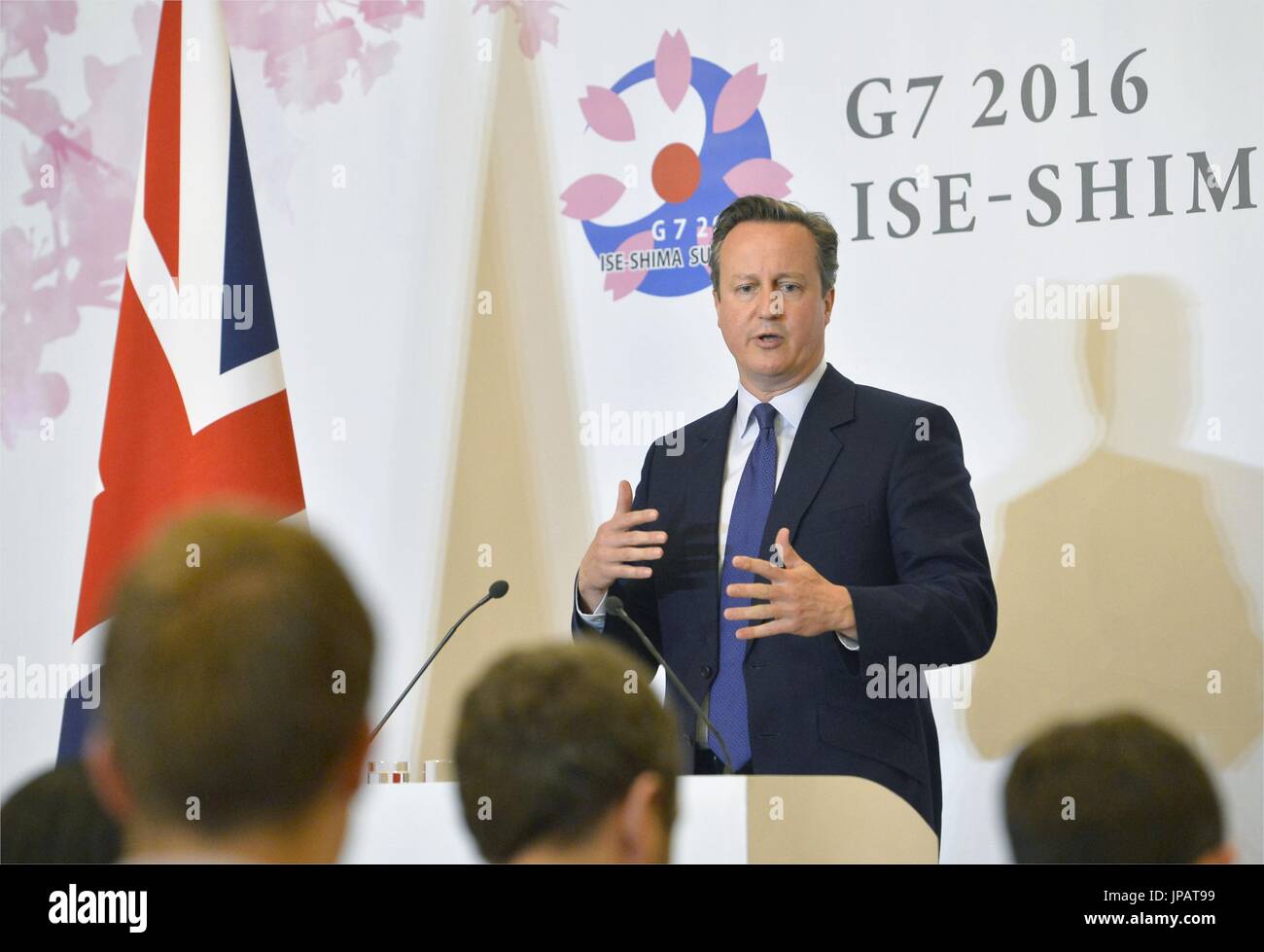 British Prime Minister David Cameron speaks at a press conference in ...