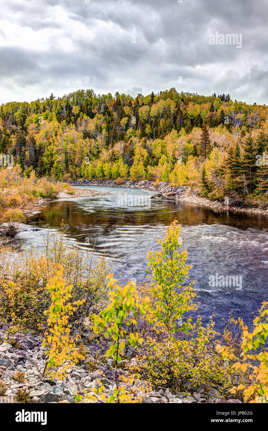Petit Saguenay river in Quebec, Canada during autumn with curve and