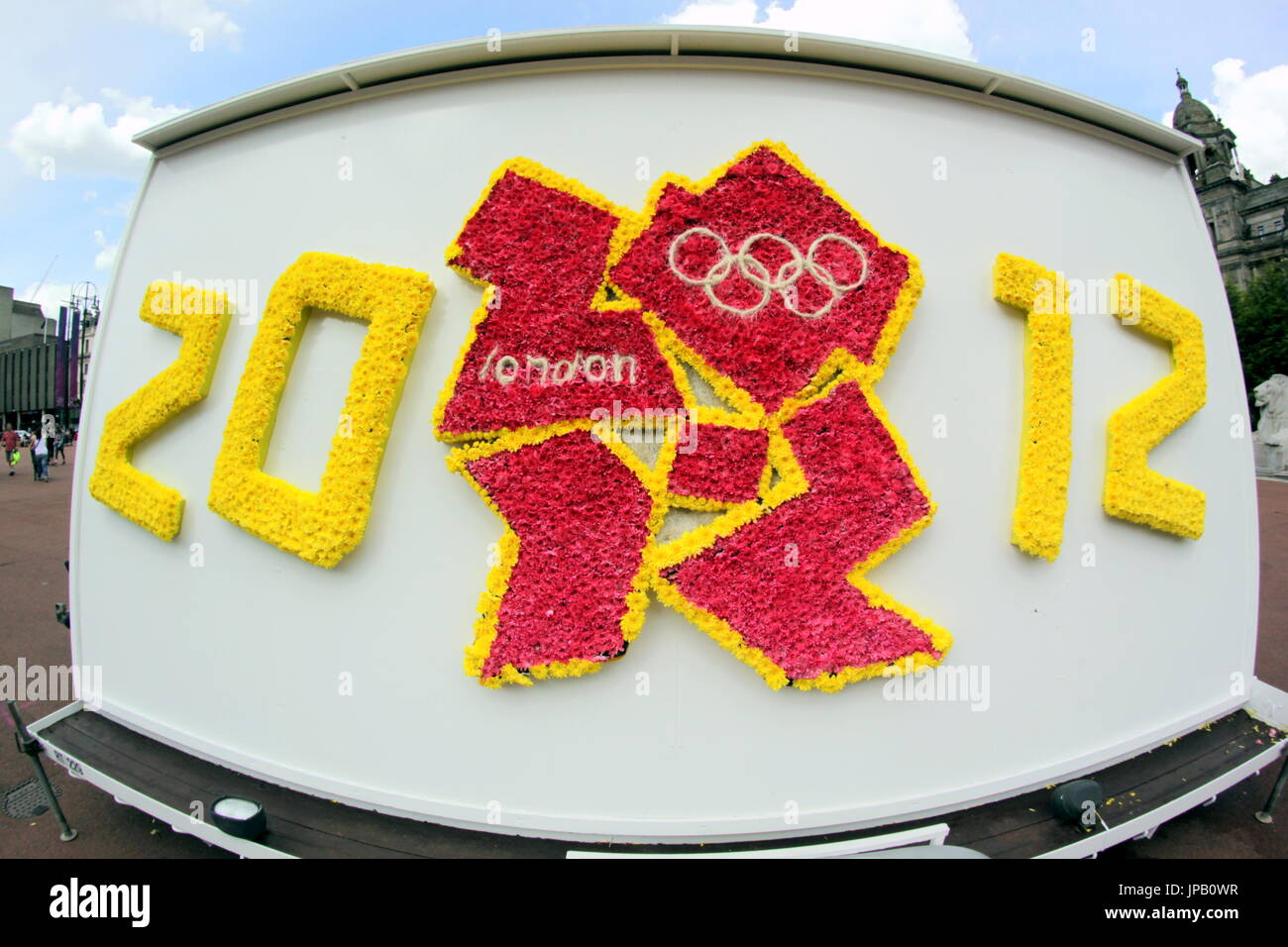 Glasgow colourful  London 2012 Olympics logo portable billboards in George square  funny rude Lisa Simpson and a hoody reference Stock Photo