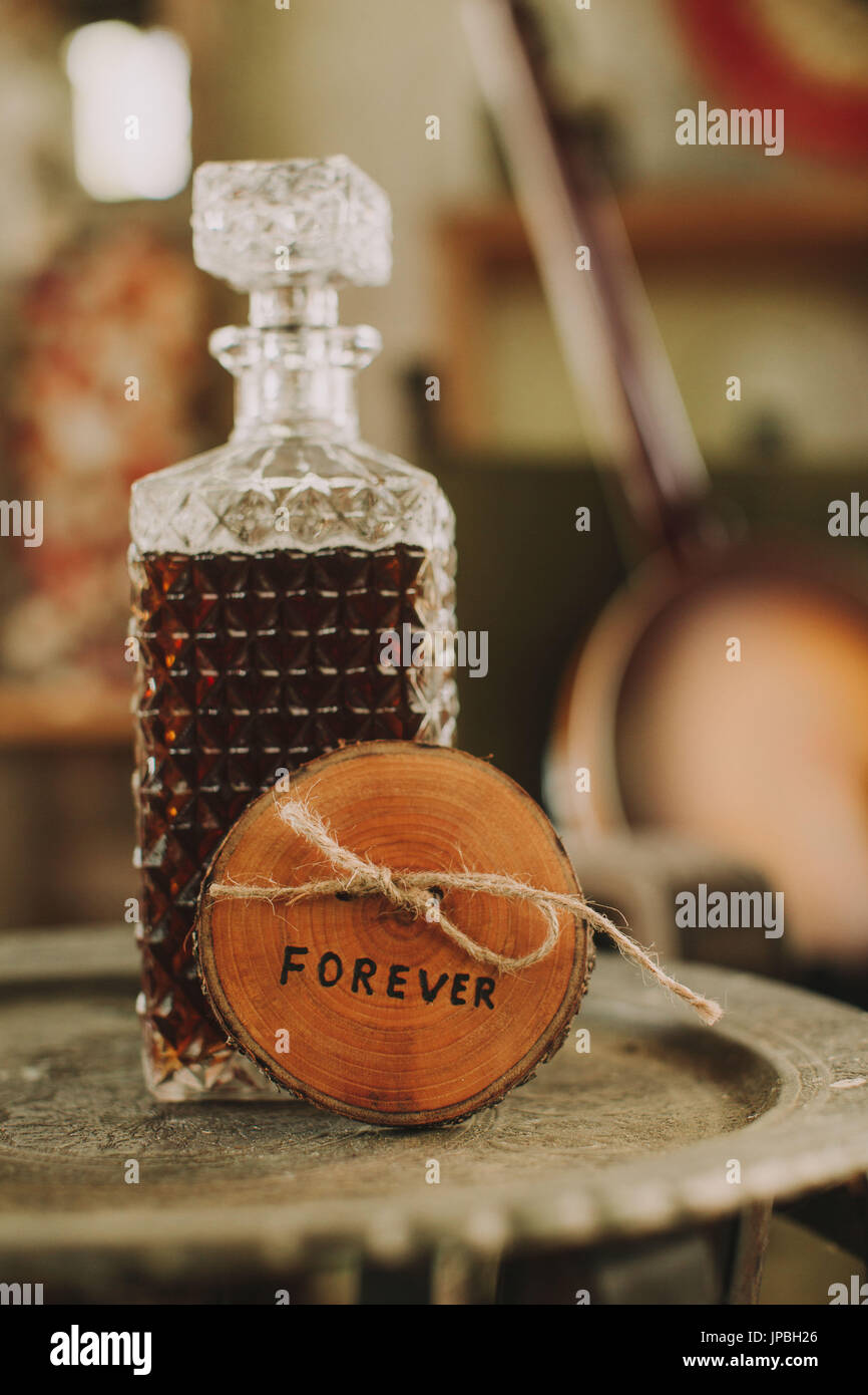 Stilllife, wedding, table with whisky and sign 'Forever', symbol, nervousness, tension, Stock Photo