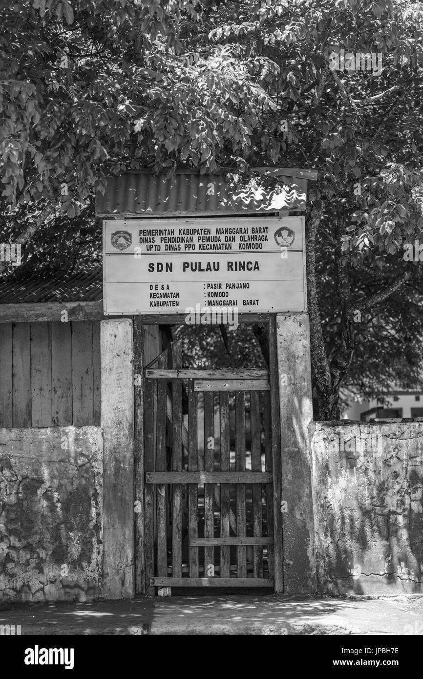 Entrance and walls of the primary school to protect children from Komodo dragons in Kampung Rinca on Pulau Rinca, Indonesia, Komodo, UNESCO, world heritage Stock Photo