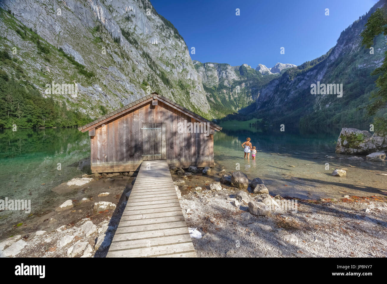 Europe, Germany, Bavaria, Berchtesgaden. Boat dock hangar on Obersee alpine lake in the Alps Stock Photo