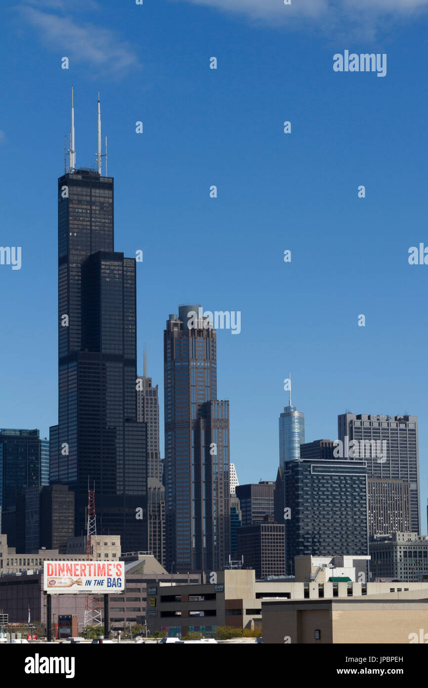 Skyline is the highers skyscraper of Chicago with two very high white antennae on the top. Illinois, United States of America. Stock Photo