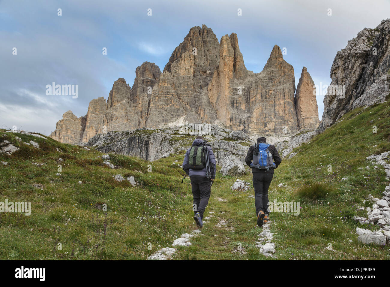Europe, Italy, Veneto, Belluno. Hikers on a path near Tre Cime di Lavaredo south side, Dolomites Stock Photo