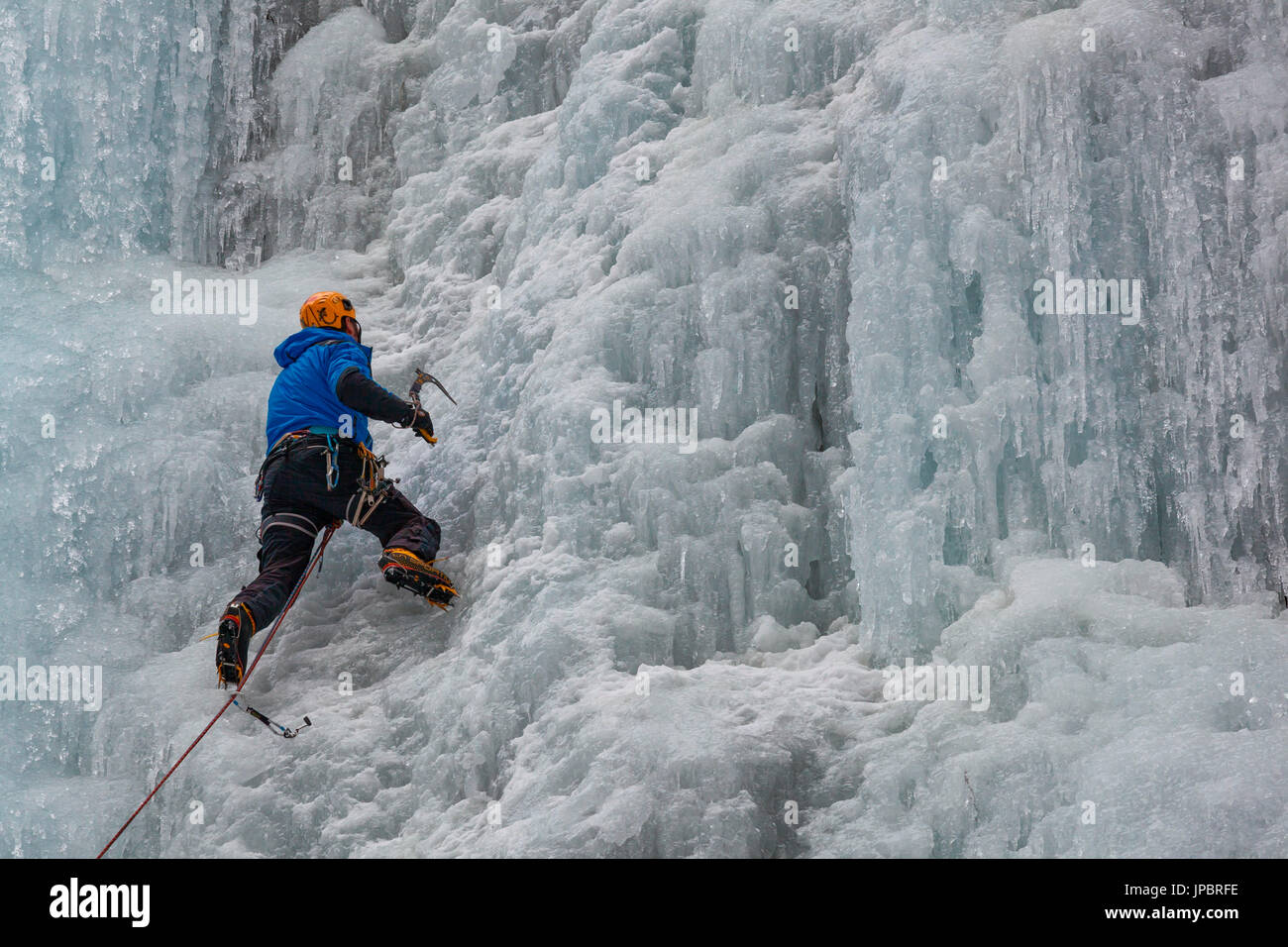 Ice climbing in Serrai of Sottoguda, Veneto, Belluno, Italy. The Cathedral, Dolomites Stock Photo