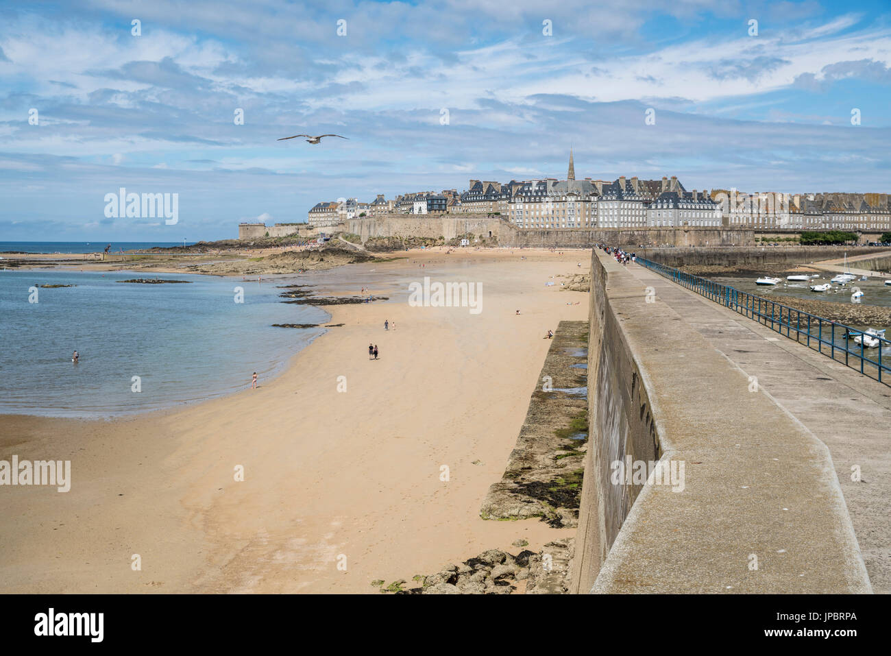 The town seen from the pier with low tide. Saint-Malo, Ille-et-Vilaine, Brittany, France. Stock Photo