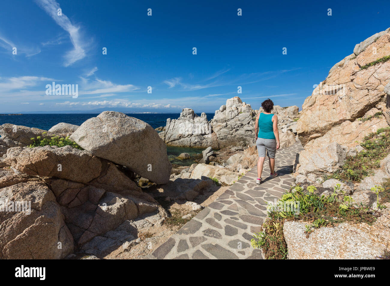 A walk on the rocky cliffs overlooking the turquoise sea Santa Teresa di Gallura Province of Sassari Sardinia Italy Europe Stock Photo