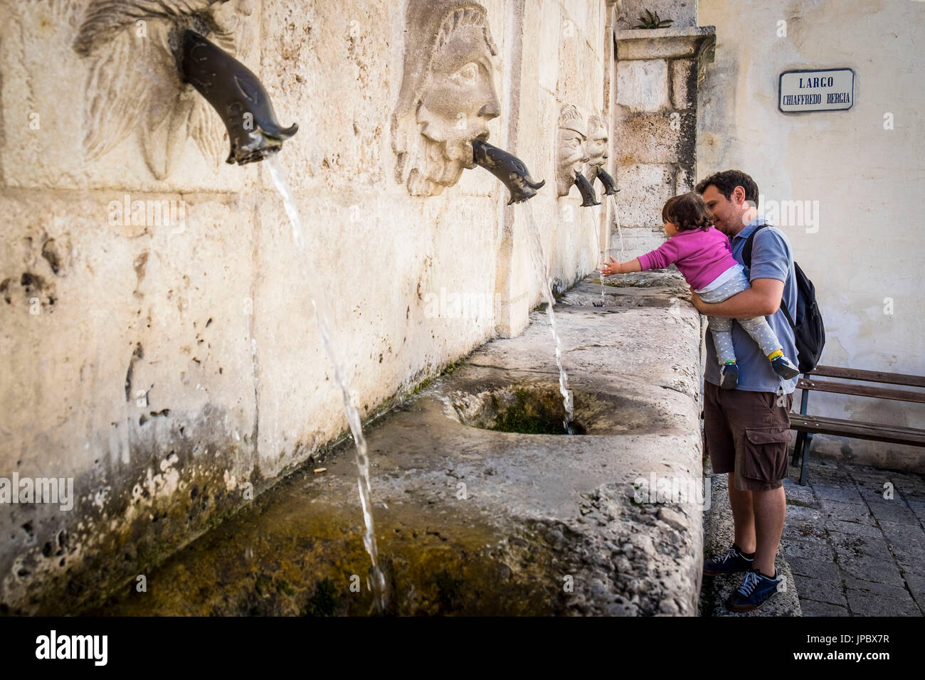 Scanno, Abruzzo, Central Italy, Europe. Refreshment at Sarracco fountain. Stock Photo